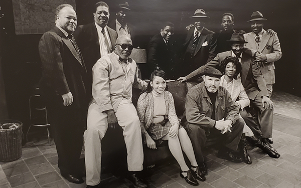 August Wilson with a theatre cast.